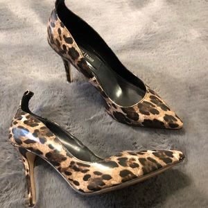 Leopard pumps.